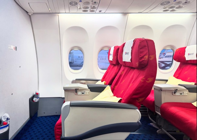 河北航空机舱头枕巾广告投放，河北航空飞机客舱广告价格